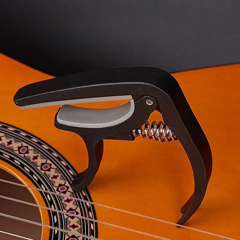 Universele 6-snarige gitaar ca - Guitar Capo Clip recensie en prijs