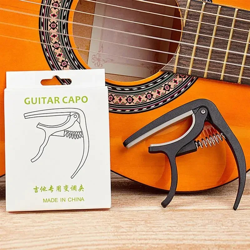 Zwarte gitaarstemklem Draagbar - Guitar Capo Clip recensie en prijs